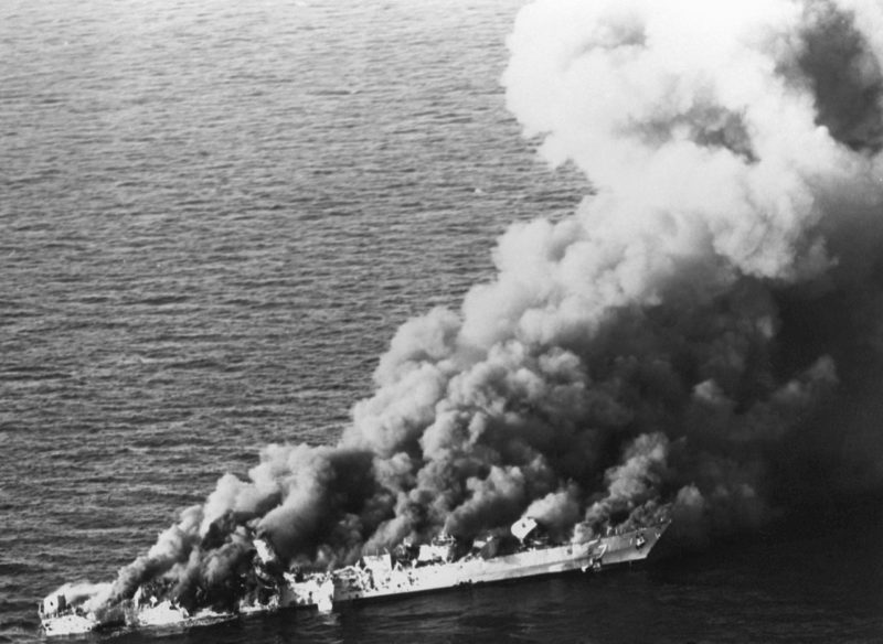 The Iranian frigate IS SAHAND (74) burns after being attacked by aircraft of Carrier Air Wing II from the nuclear-powered aircraft carrier USS ENTERPRISE (CVN-65) in retaliation for the mining of the guided missile frigate USS SAMUEL B. ROBERTS (FFG-58). The ship was hit by three Harpoon missiles plus cluster bombs.