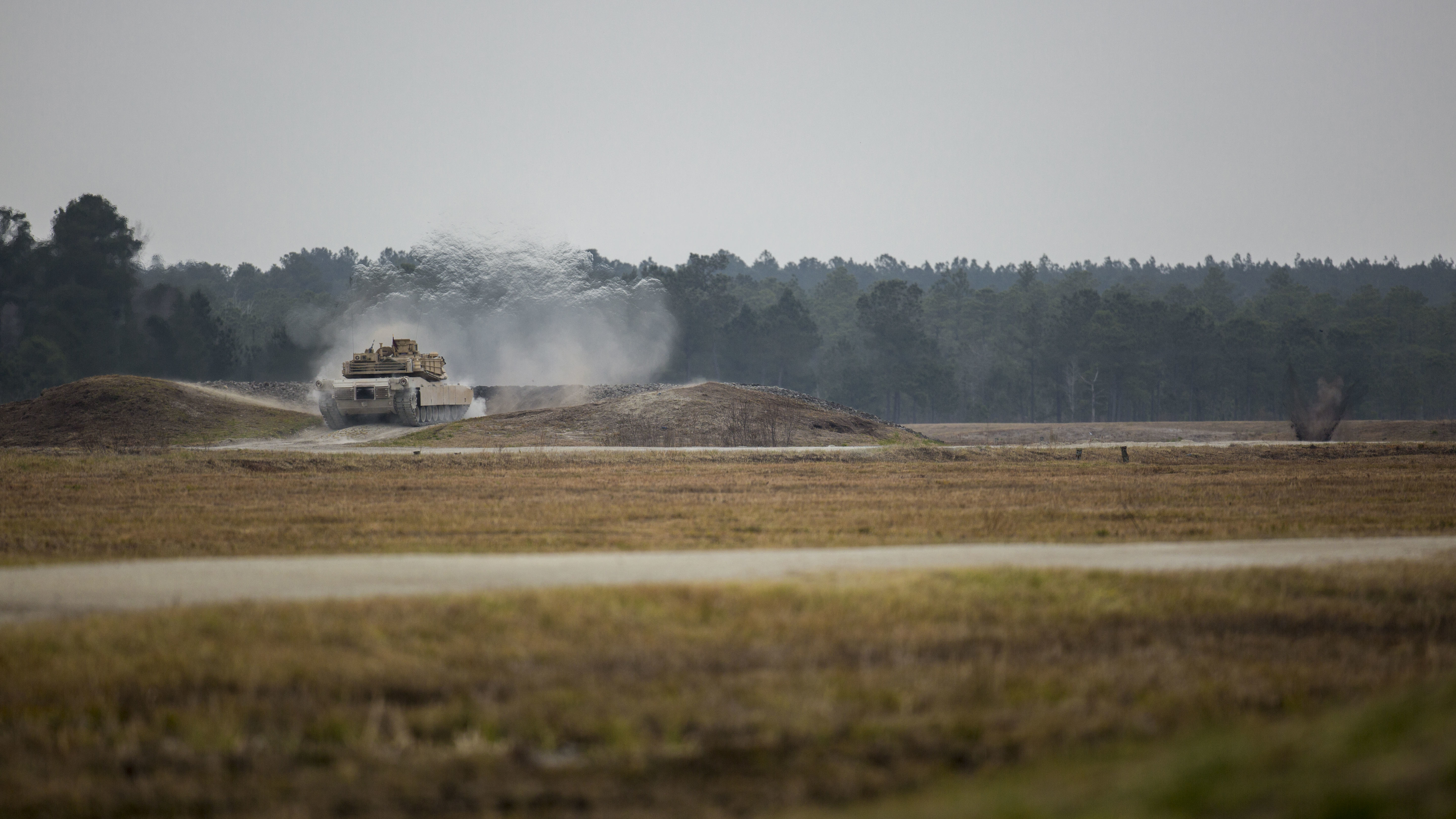 U.S. Marines with Company B, 2nd Tank Battalion, fires a 120mm smoothbore main gun from an M1A1 Abrams Main Battle Tank during a live-fire exercise at Range SR-10, Camp Lejeune, N.C., Jan. 28, 2016. 2nd Tank Battalion conducted marksmanship qualifications during a month-long field exercise. (U.S. Marine Corps photo by Lance Cpl. Judith L. Harter, MCIEAST Combat Camera/Released)