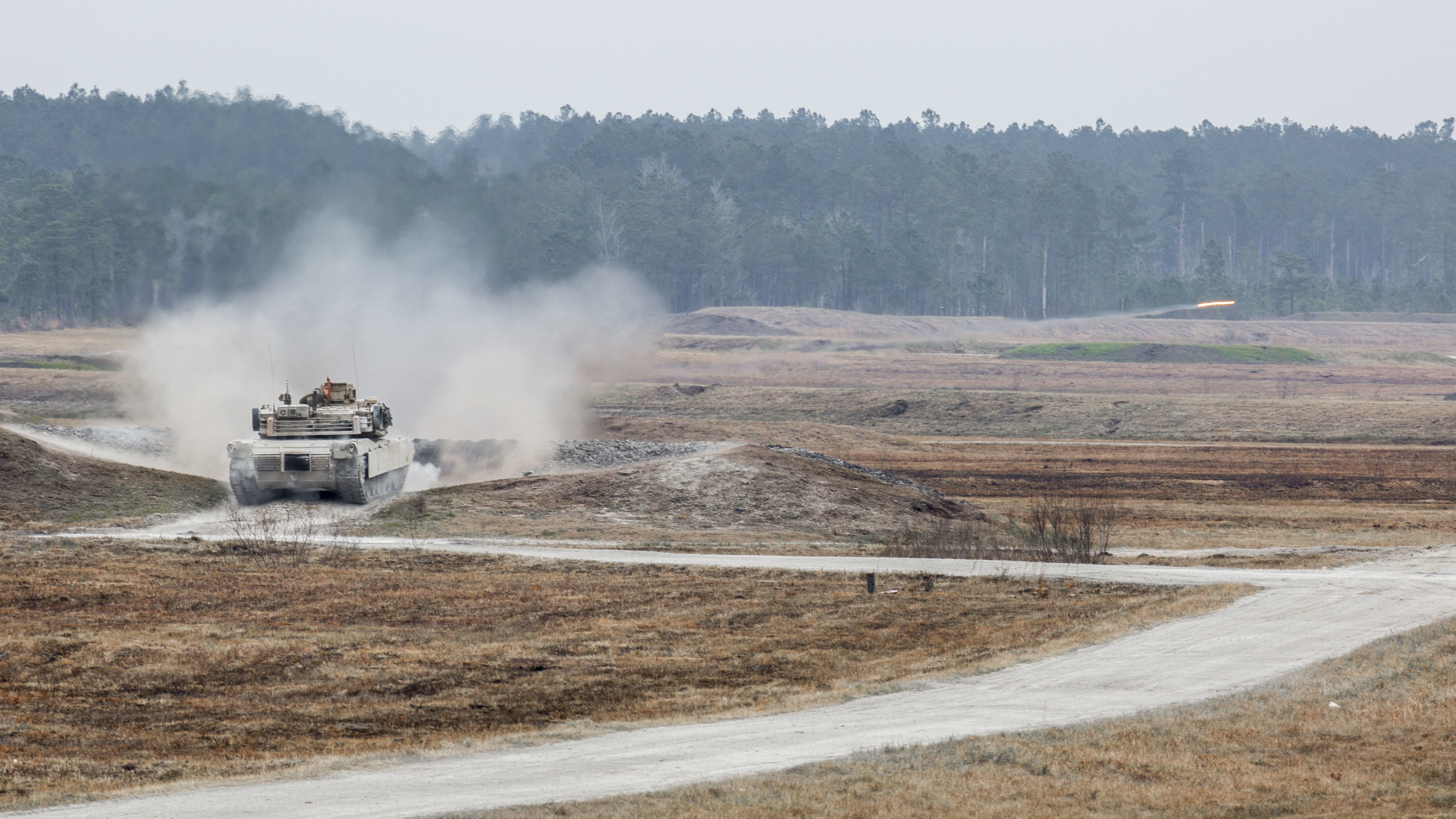 U.S. Marines with Company B, 2nd Tank Battalion, fire a 120mm smoothbore main gun from an M1A1 Abrams Main Battle Tank during a live-fire exercise at Range SR-10, Camp Lejeune, N.C., Jan. 28, 2016. 2nd Tank Battalion conducted marksmanship qualifications during a month-long field exercise. (U.S. Marine Corps photo by Sgt. Christopher Q. Stone, MCIEAST Combat Camera/Released)