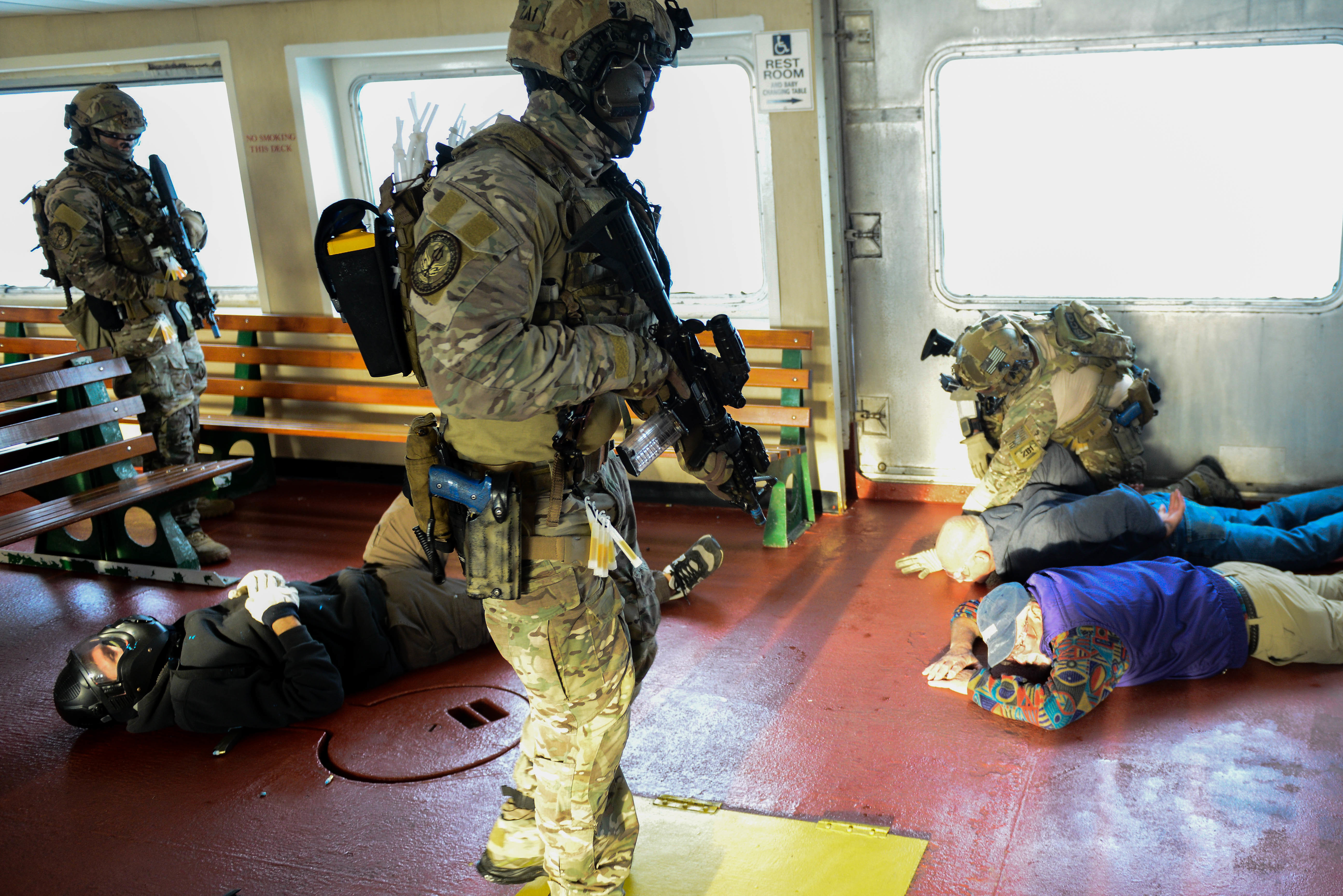 The Coast Guard’s Maritime Security Response Team (MSRT) from Virginia participates in a training evolution in Hyannis, Mass., Thursday, Oct., 22, 2015. The highly trained and specialized team, using a real-world underway ferry, practiced tactical boardings-at-sea, active shooter scenarios, and detection of radiological material. (U.S. Coast Guard photo by Petty Officer 3rd Class Ross Ruddell)